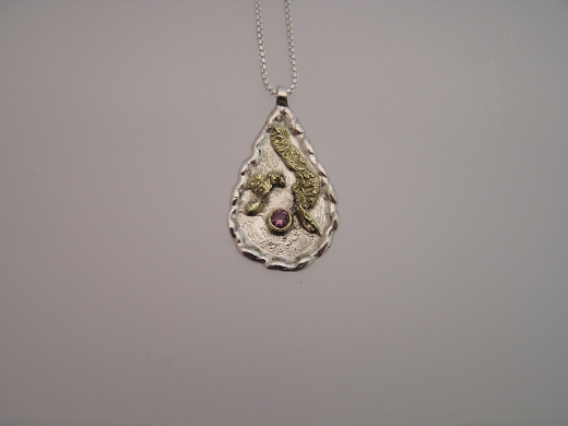 Silver & 18ct gold pendant with pink Sapphire